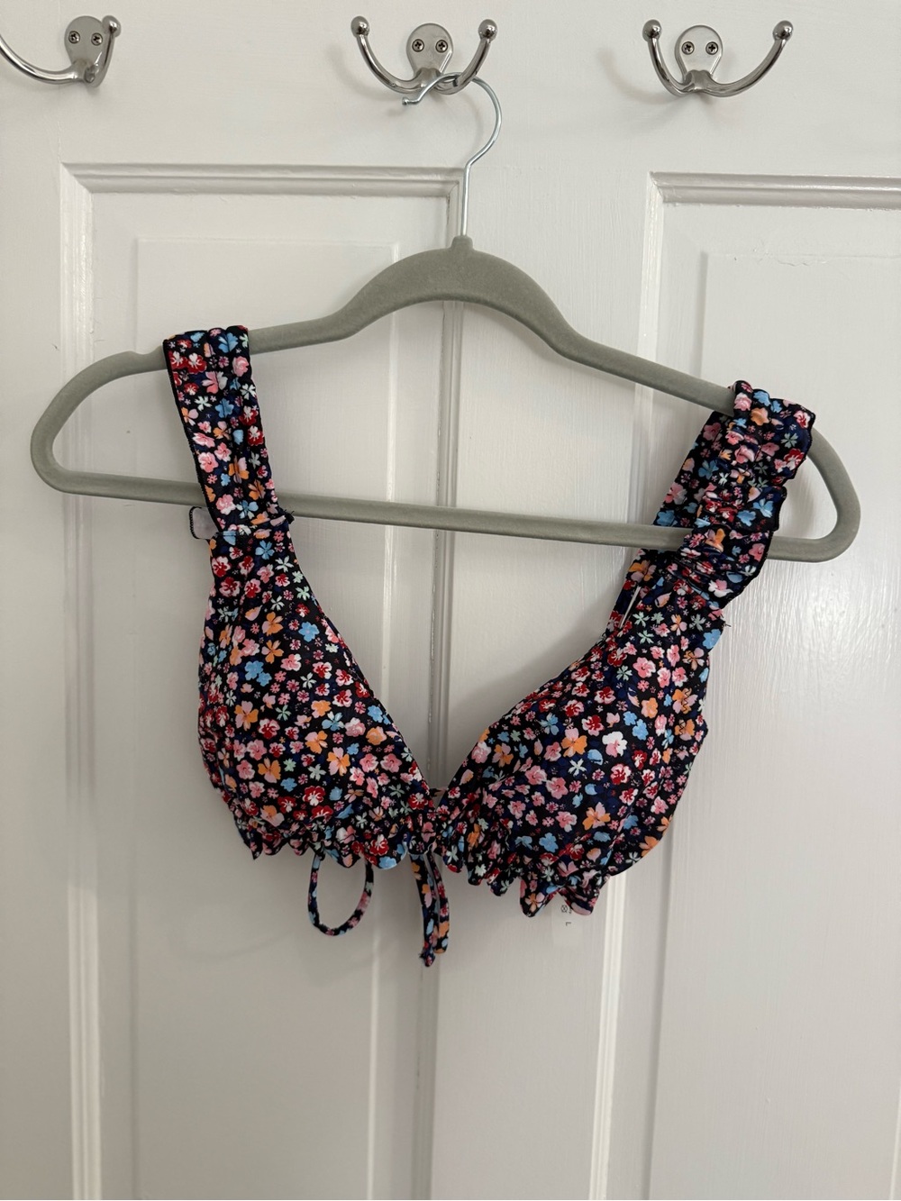 Five bathing suit tops and VS cover up